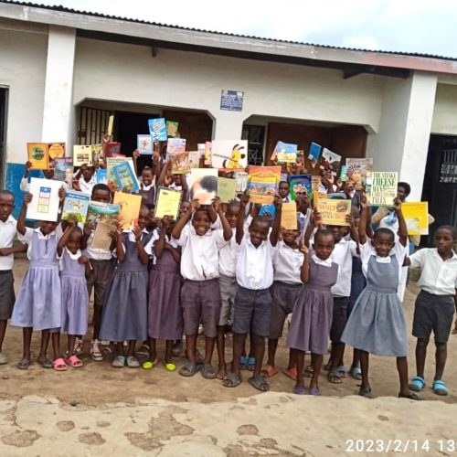 Kenya, African children with their library books